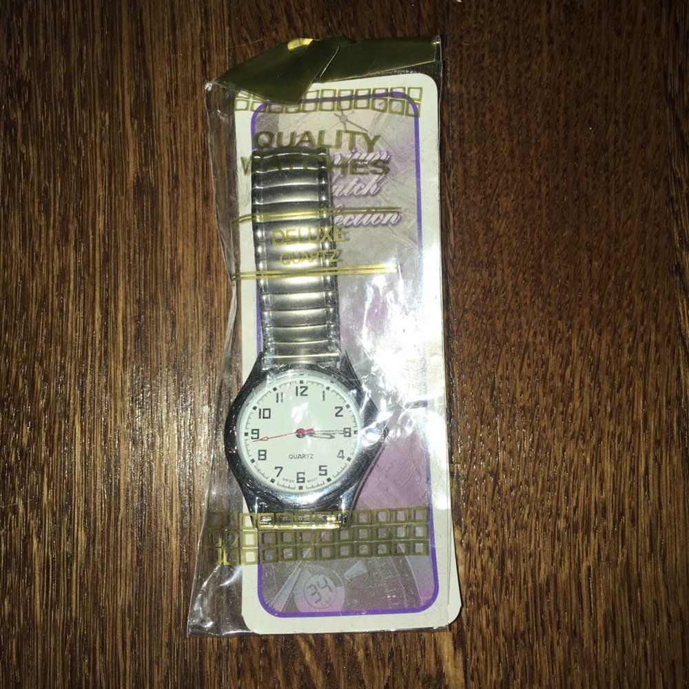Men’s stainless steel/silver stretch band watch